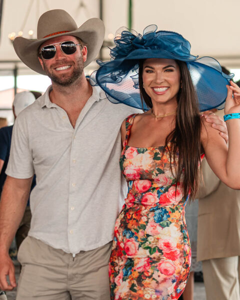 Couple posting for photo at NTL event