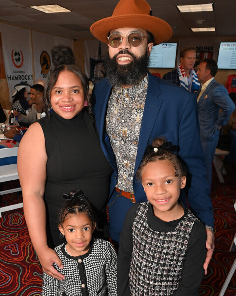 Family posing for photo at NTL event